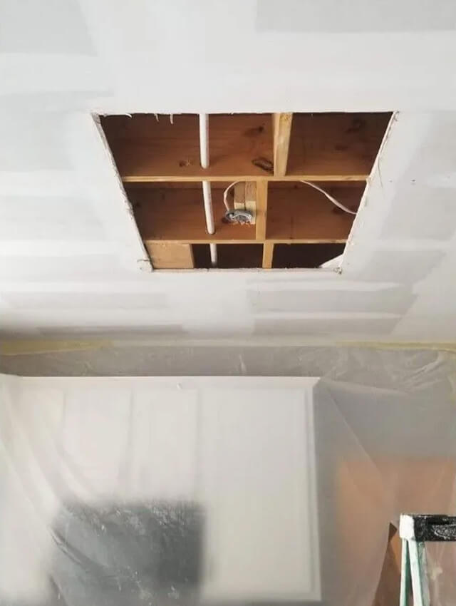 services-drywall-patchwork Drywall ceiling cut-out prepared for repair work
